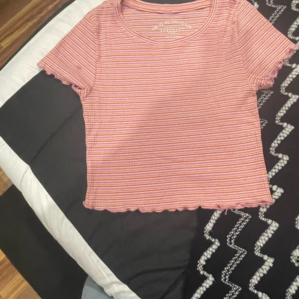 This is a more summery color but it’s cute sling this tee from aero
